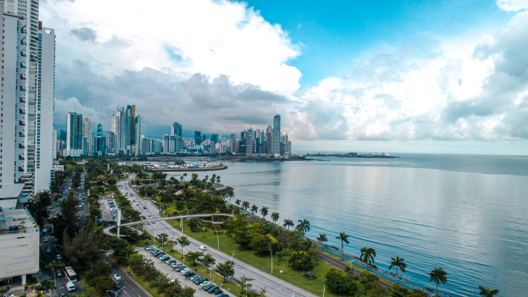 https://unsplash.com/photos/a-large-body-of-water-with-a-city-in-the-background-JBjd0IBIAl8