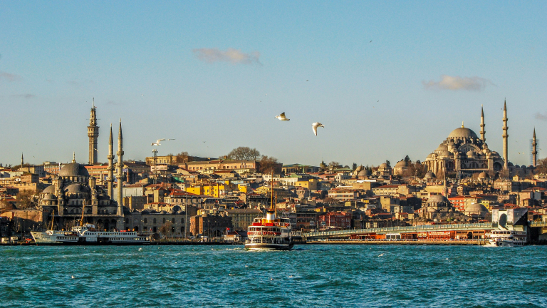https://unsplash.com/photos/city-buildings-near-body-of-water-during-daytime-WA1u0scVLZU