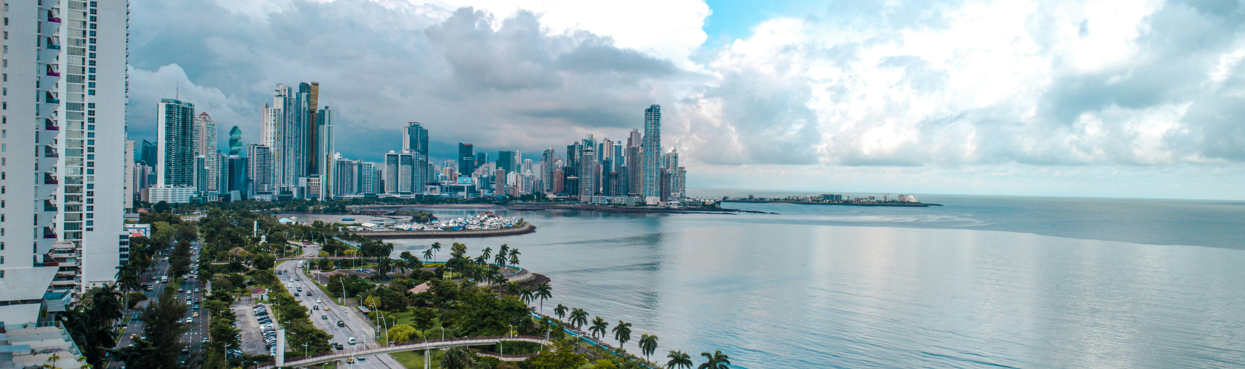 https://unsplash.com/photos/a-large-body-of-water-with-a-city-in-the-background-JBjd0IBIAl8